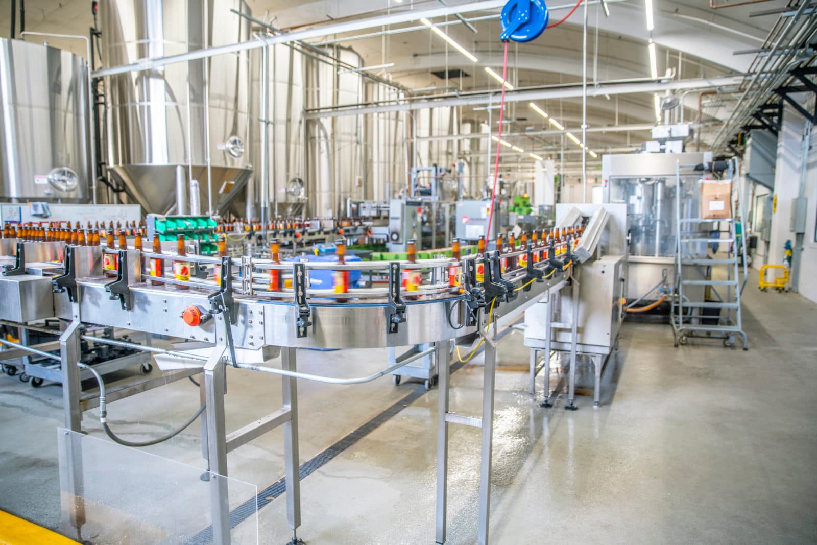 Brewery canning line in bright facility