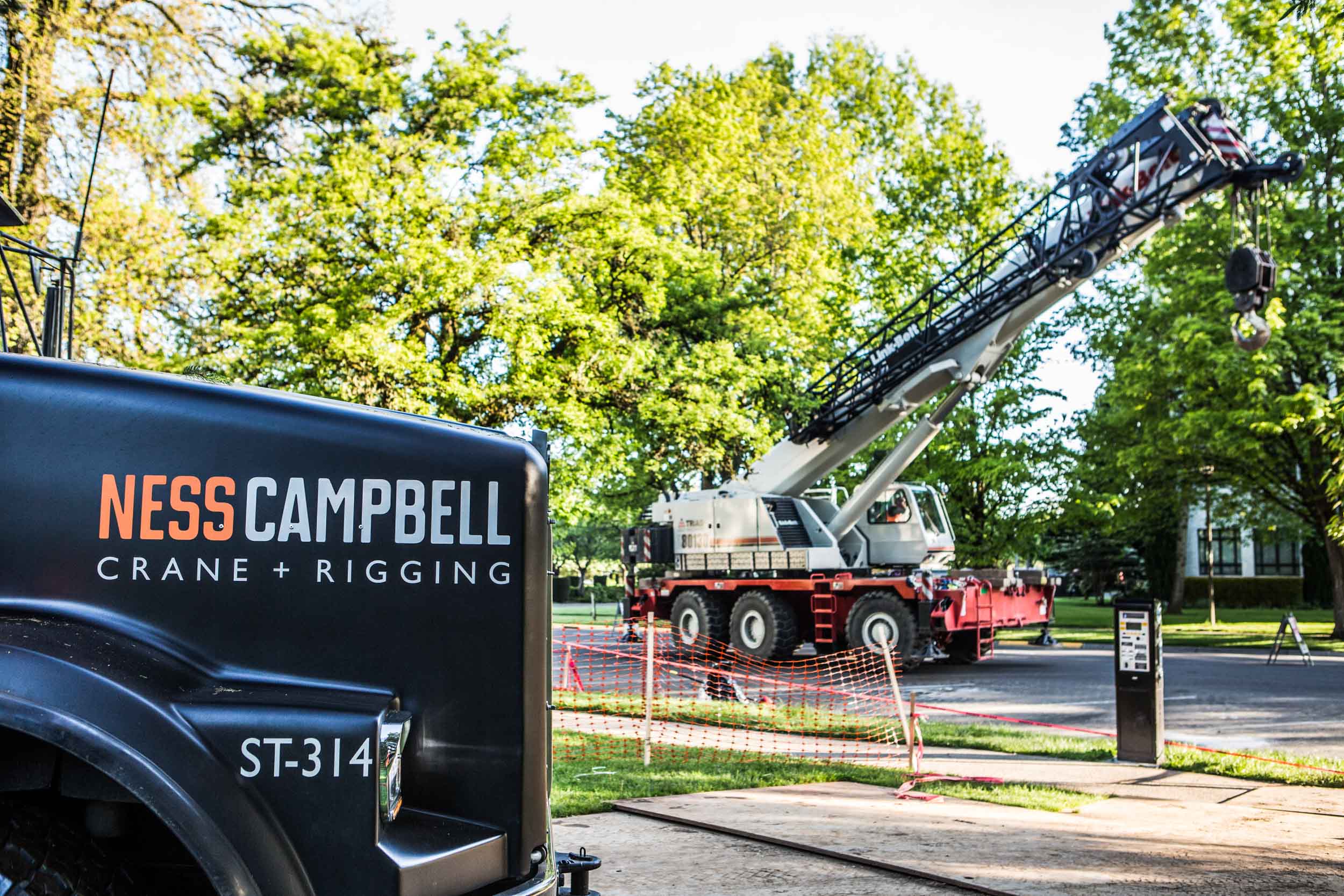 NessCampbell truck door with crane behind