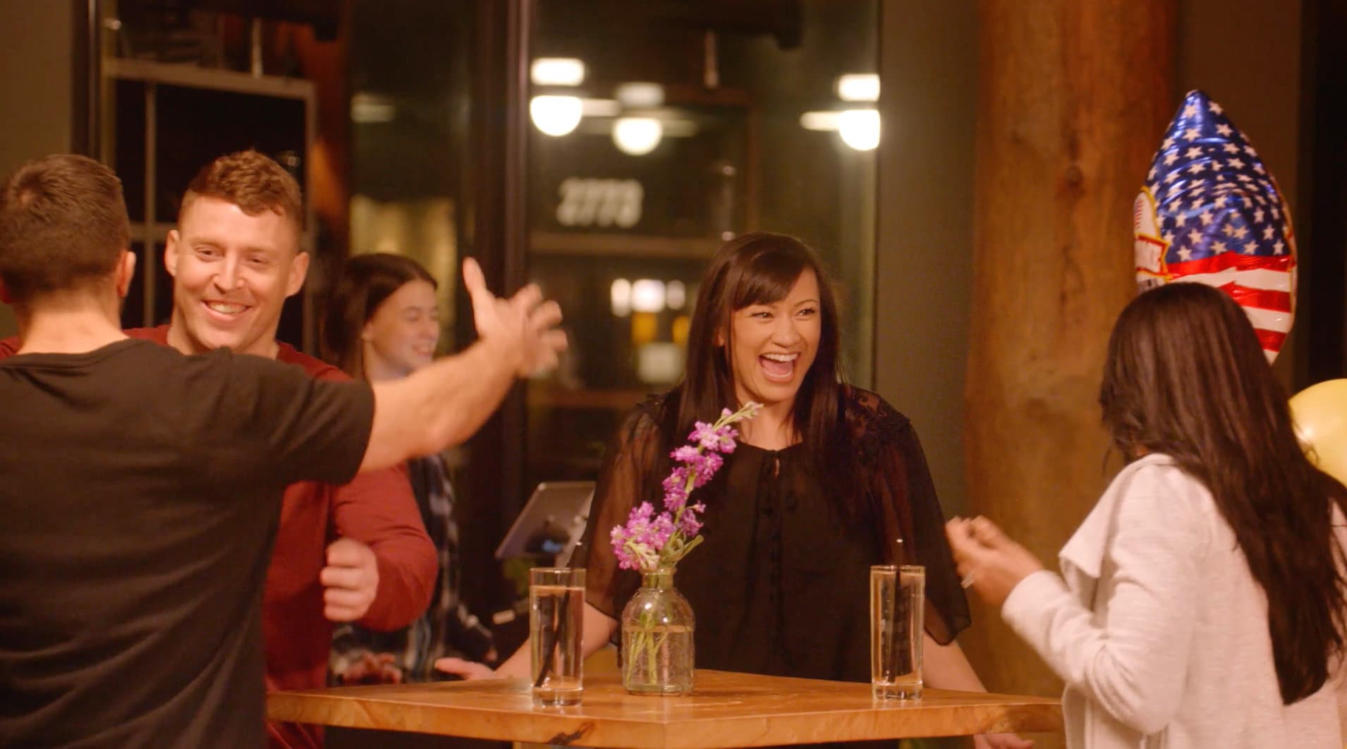 Friends toasting in brewery taproom