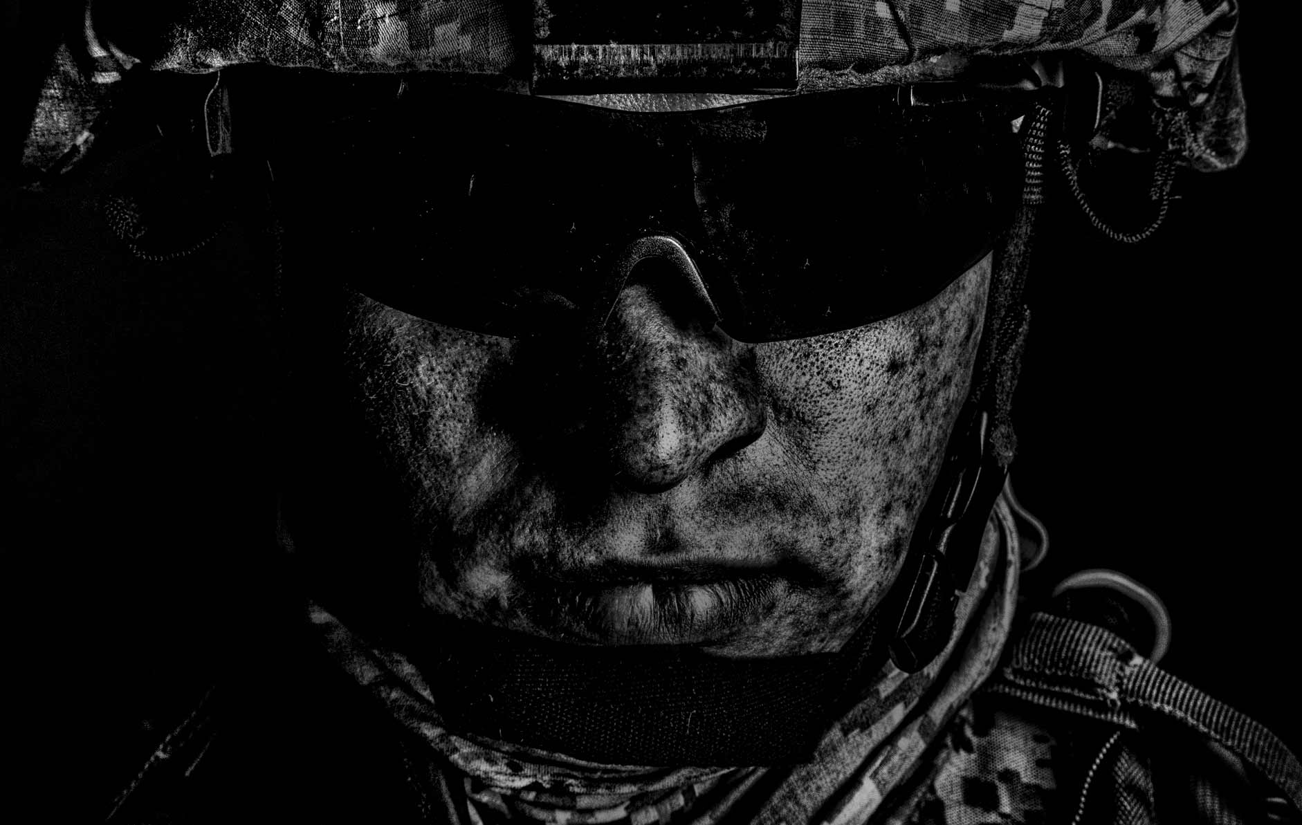 Soldier face in dark low-key light